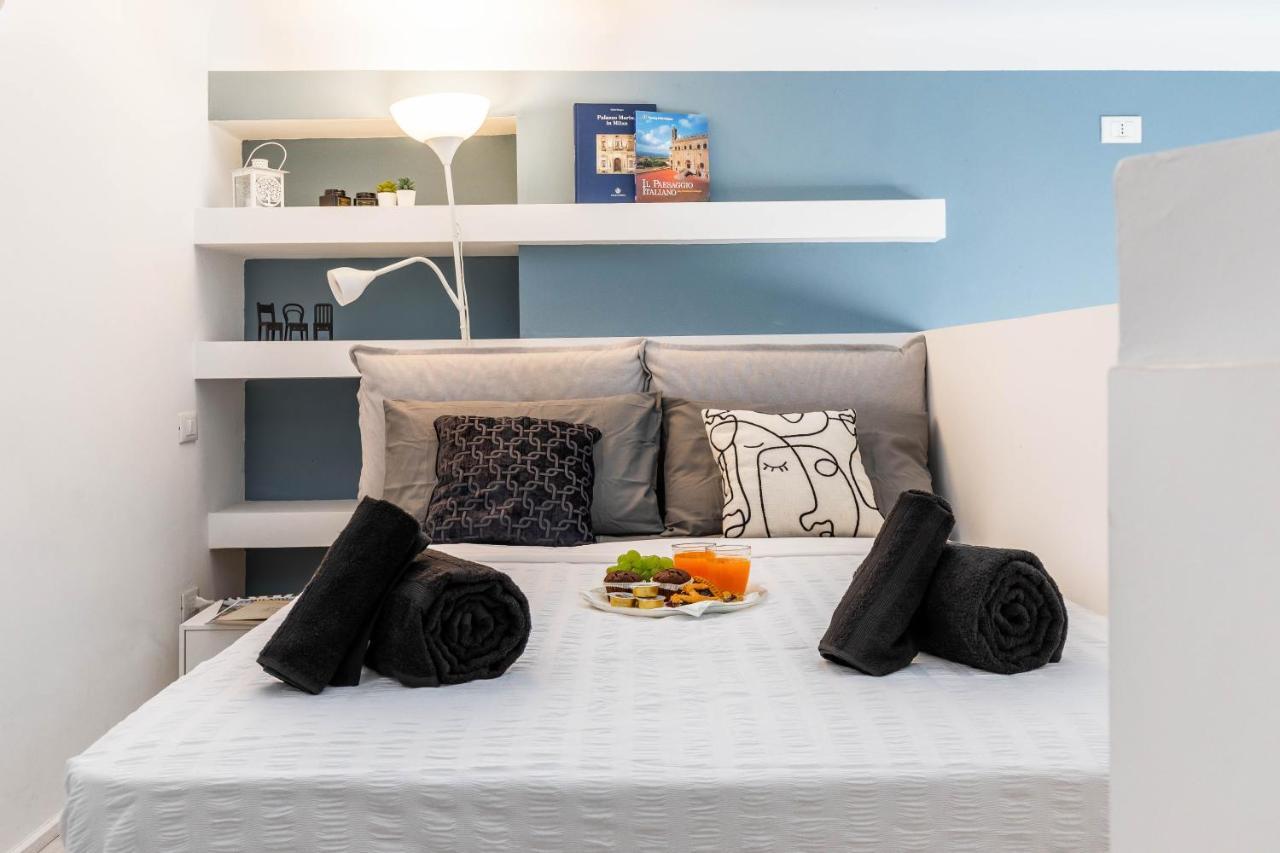 Duomo In 8 Stops Suite Deluxe Loft มิลาน ภายนอก รูปภาพ